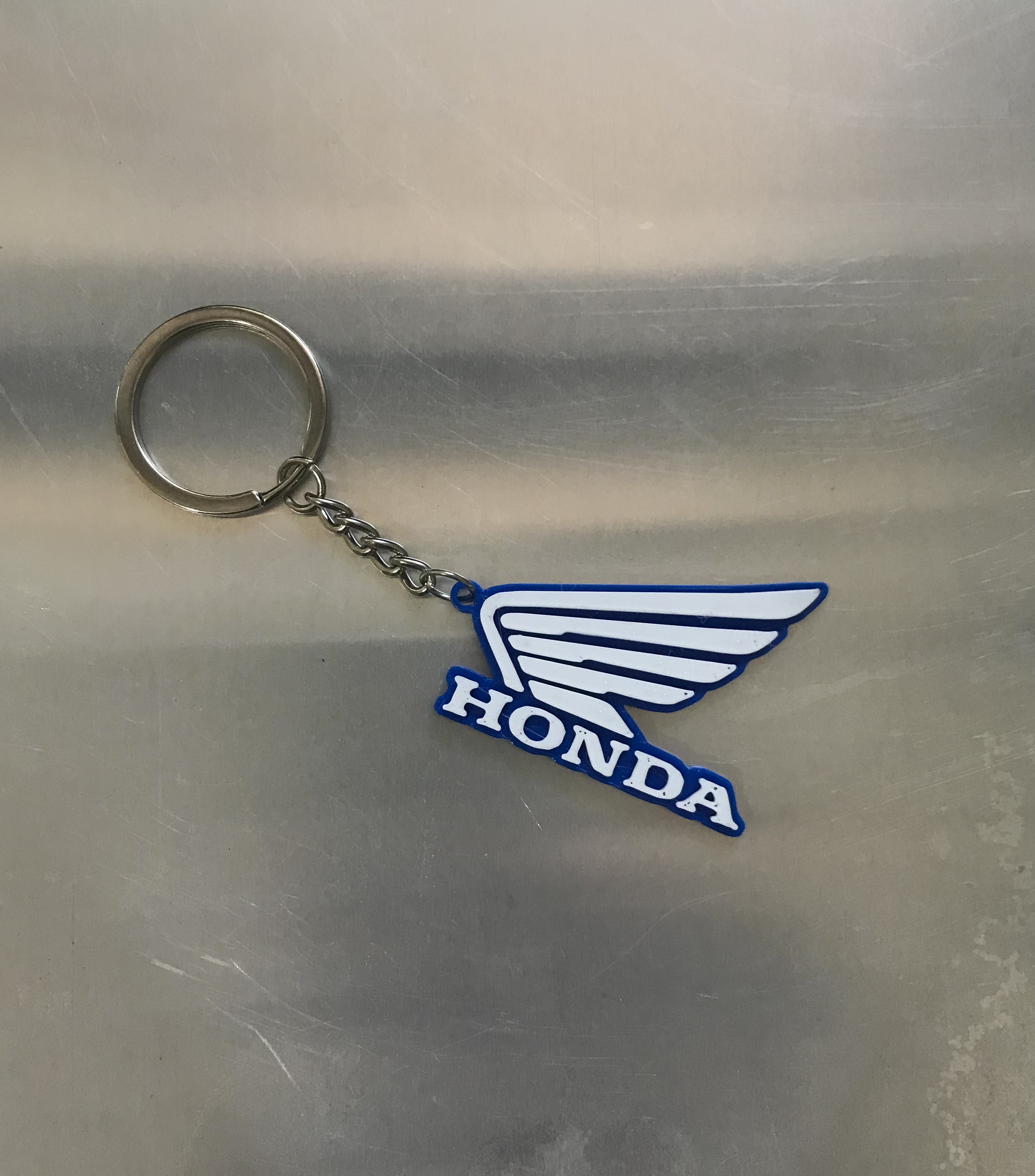 Llavero HONDA azul con blanco