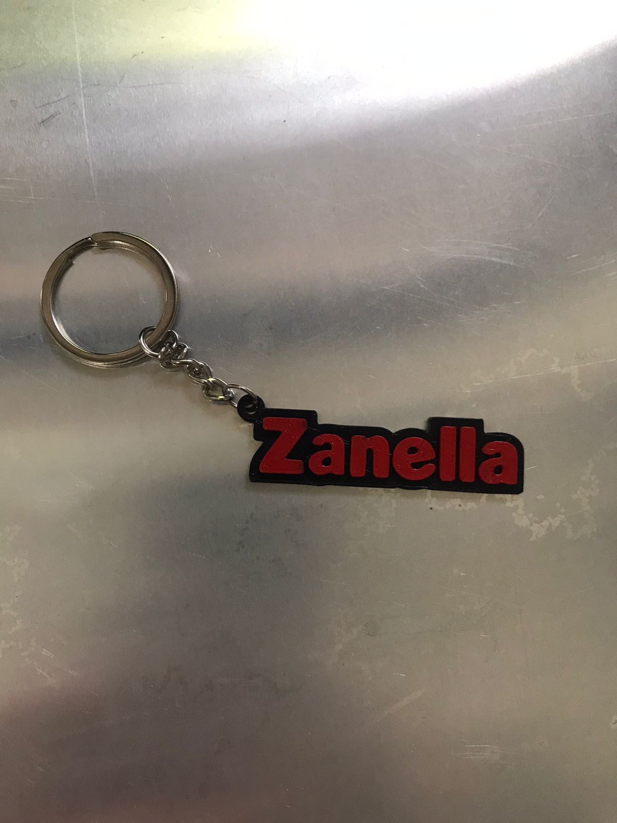 Llavero ZANELLA negro con rojo 