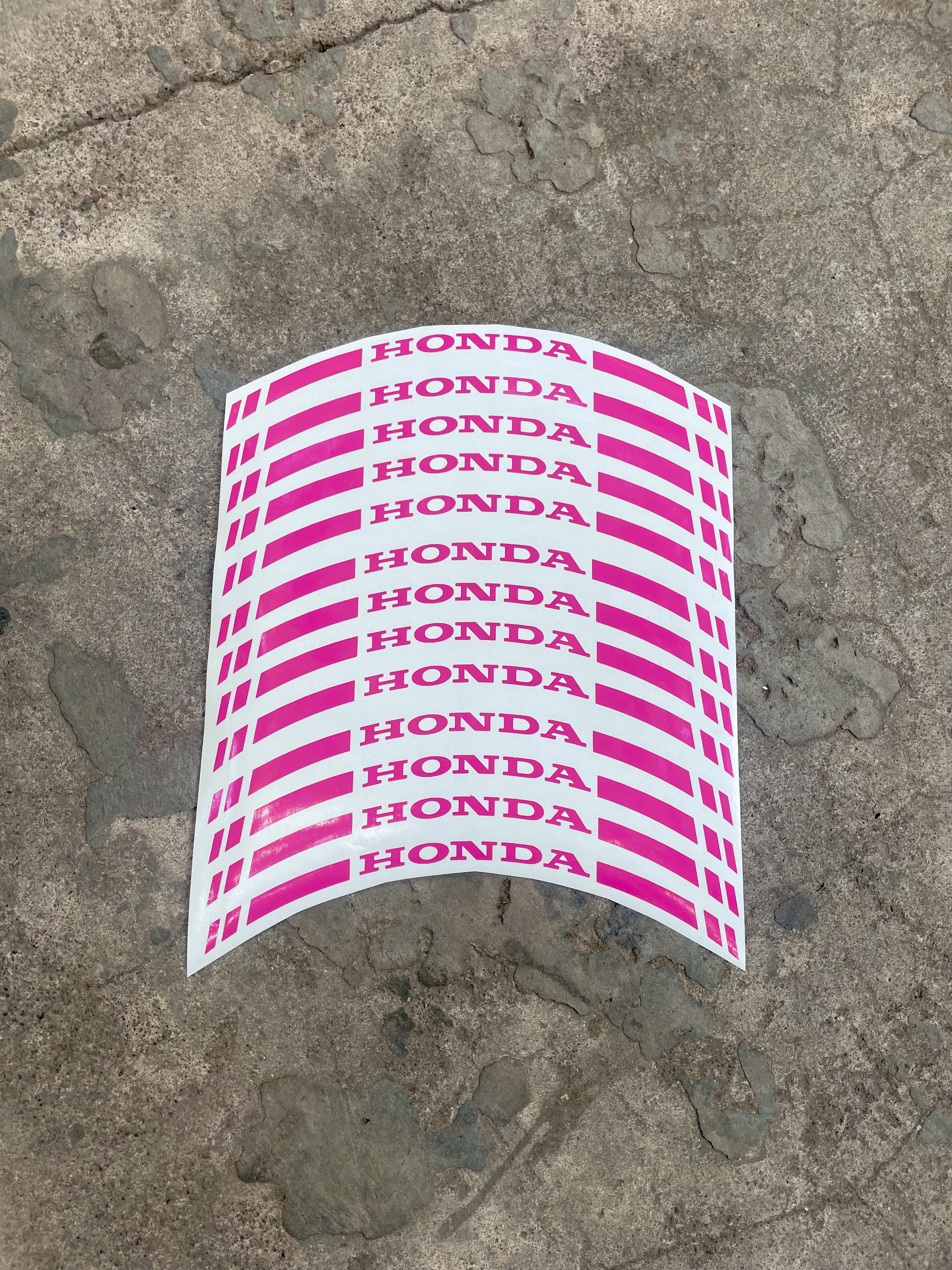 calcos llantas Honda tira fucsia
